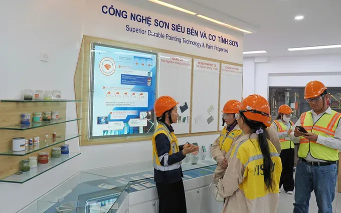 Workers in a Vietnamese high-tech manufacturing facility