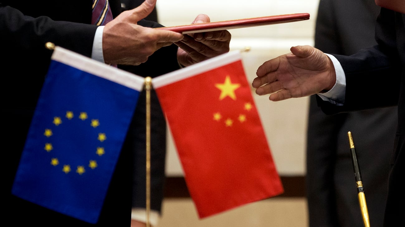 European Union and Chinese flags representing the growing bilateral trade imbalance