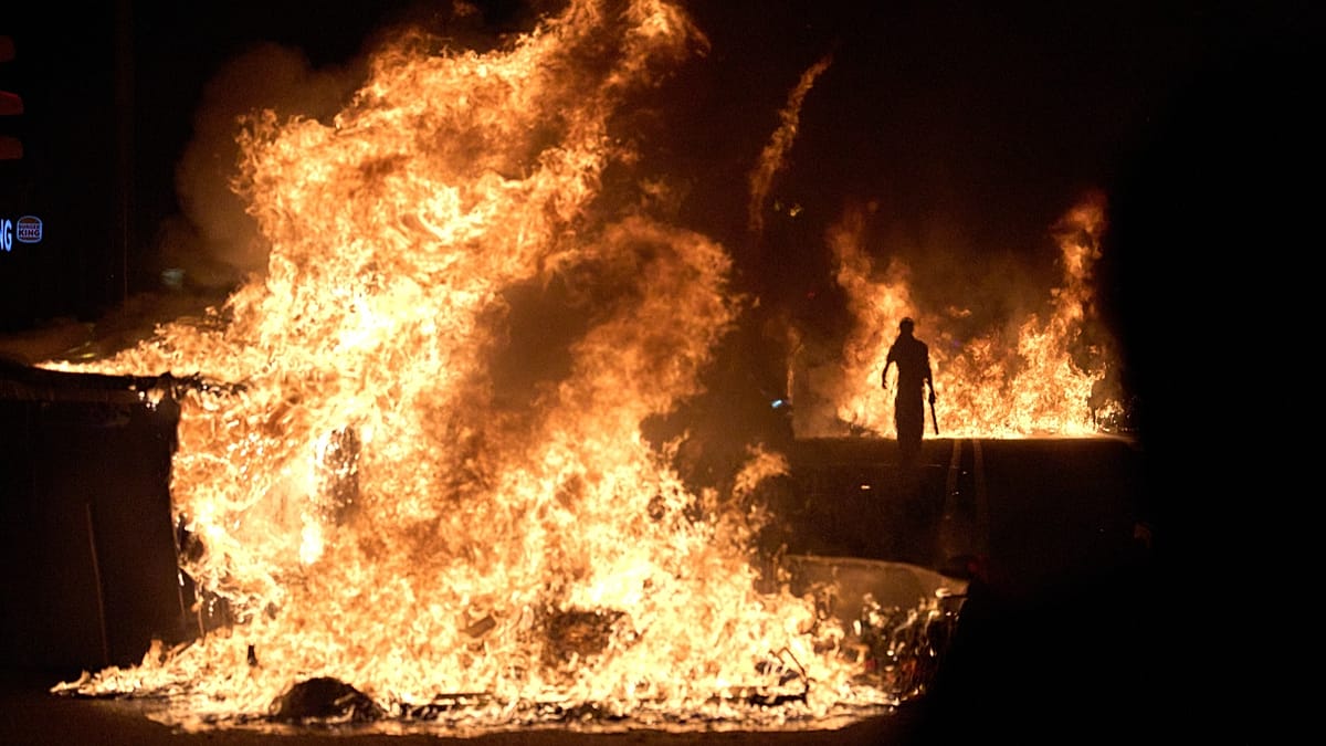 Burning barricades during Barcelona housing protests
