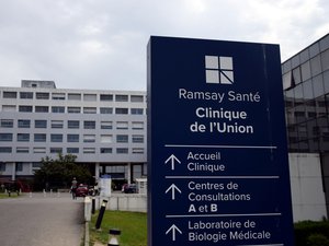 Outside a French clinic maternity building