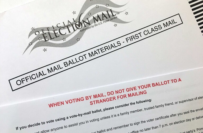 Federal courthouse with voting signage