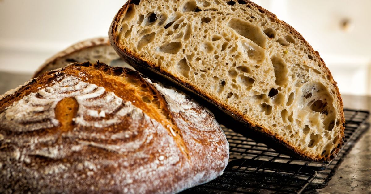 Austrian baker Stefan Szihn demonstrates sourdough fermentation techniques during Vienna's October Bread Month celebration