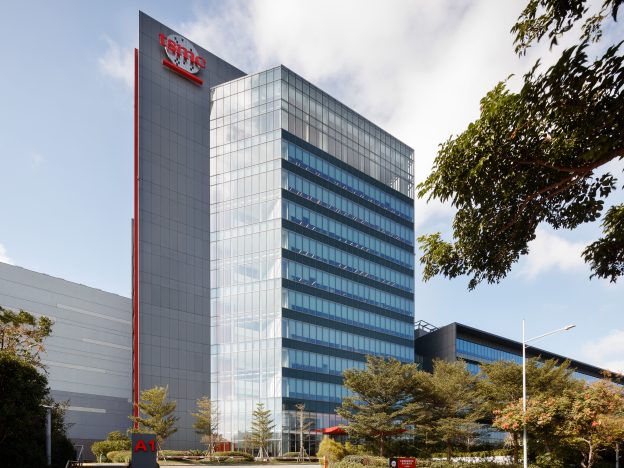 TSMC Fab 15A exterior photograph showing manufacturing facility