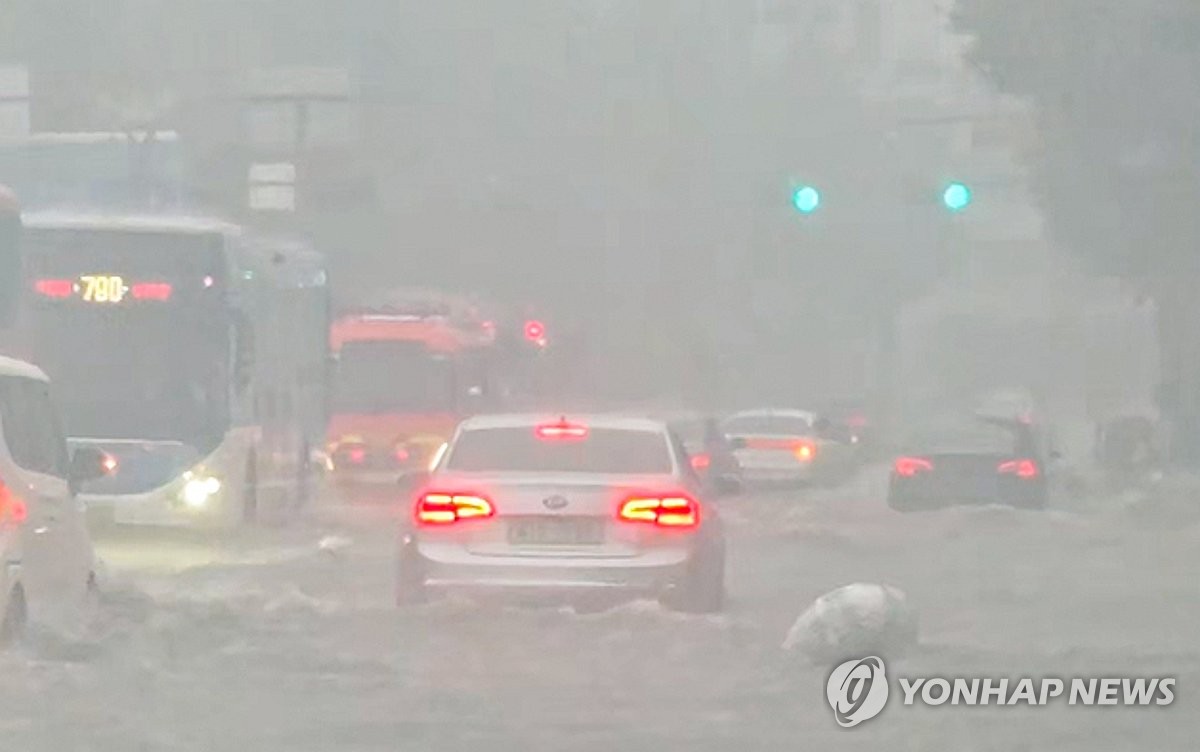 A flooded street in Incheon after heavy rain