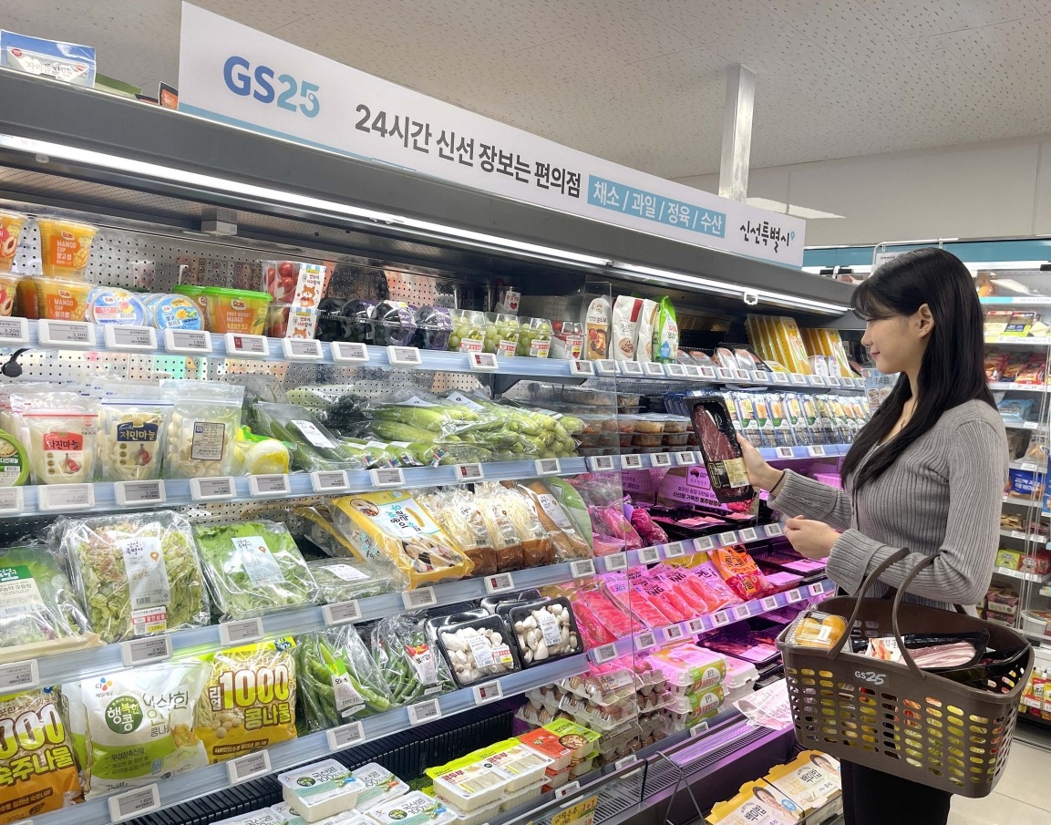 A modern, specialized convenience store interior with distinct product zones