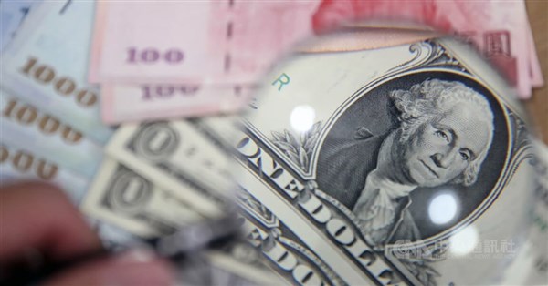 Image depicting currency exchange rates or financial charts showing the Taiwan dollar's decline