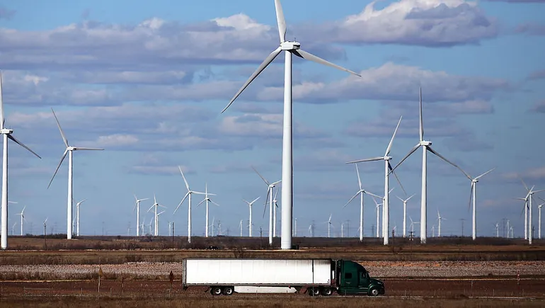 Wind turbines against a clear sky
