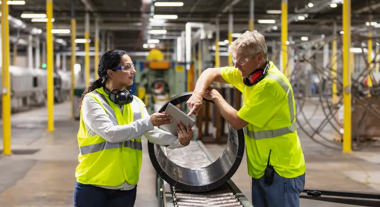 Aerial view of manufacturing facility representing cybersecurity risks in the sector