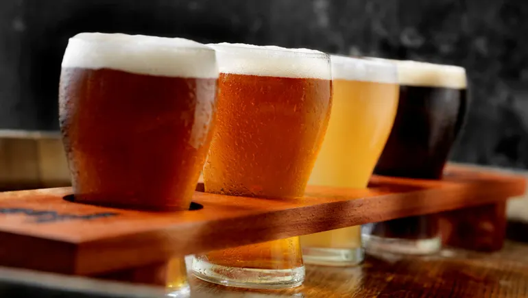 Craft beer taps at a bar representing the shift in brewing styles