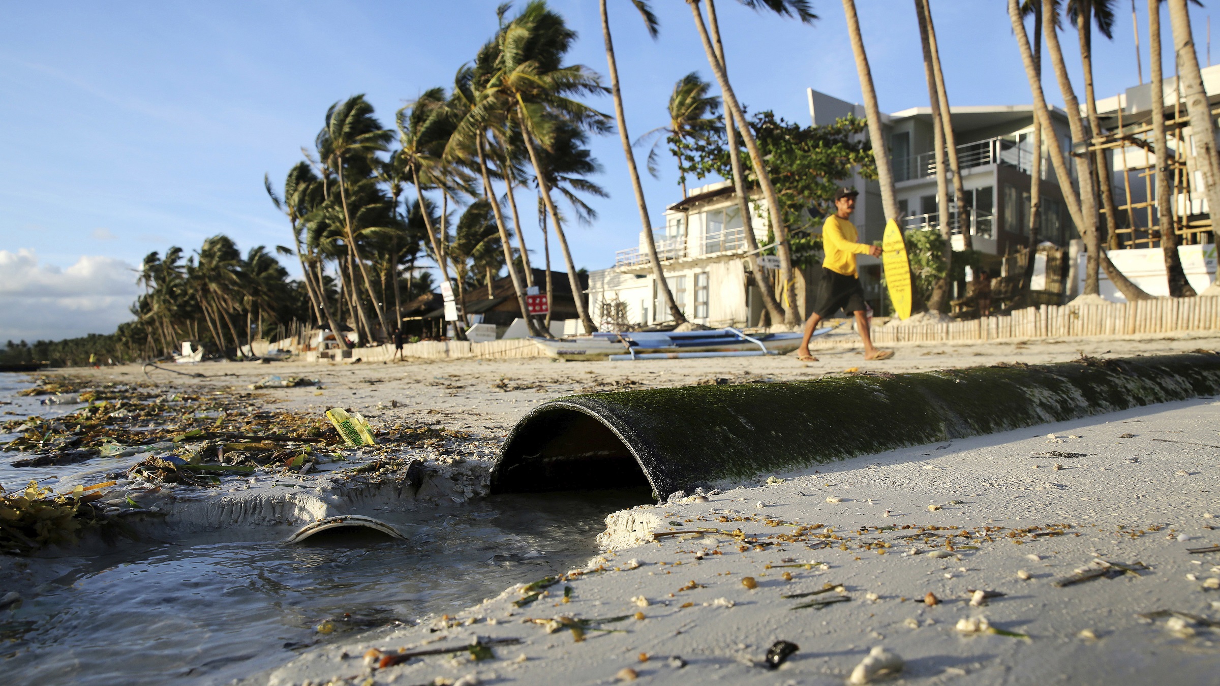 Coral reef threatened by sewage and wastewater pollution inside a marine protected area