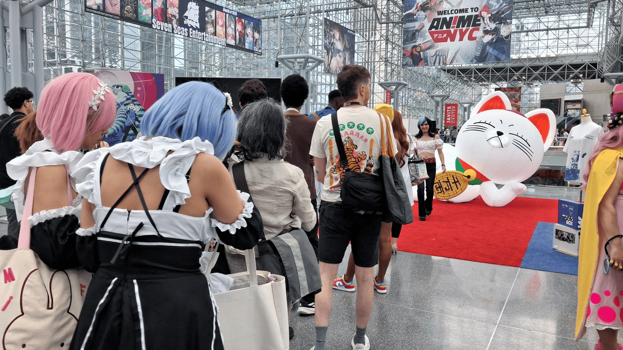 Photo op at Anime NYC 2026 showing attendees and guests