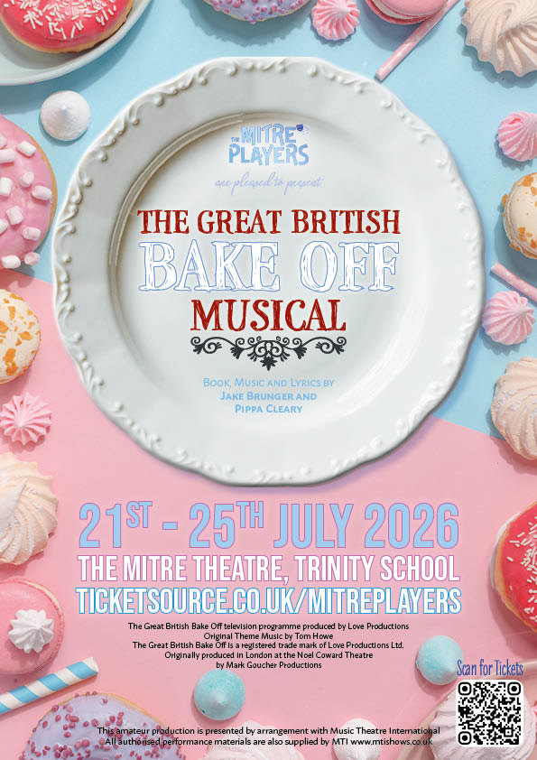 A theatrical stage setting with baking competition elements