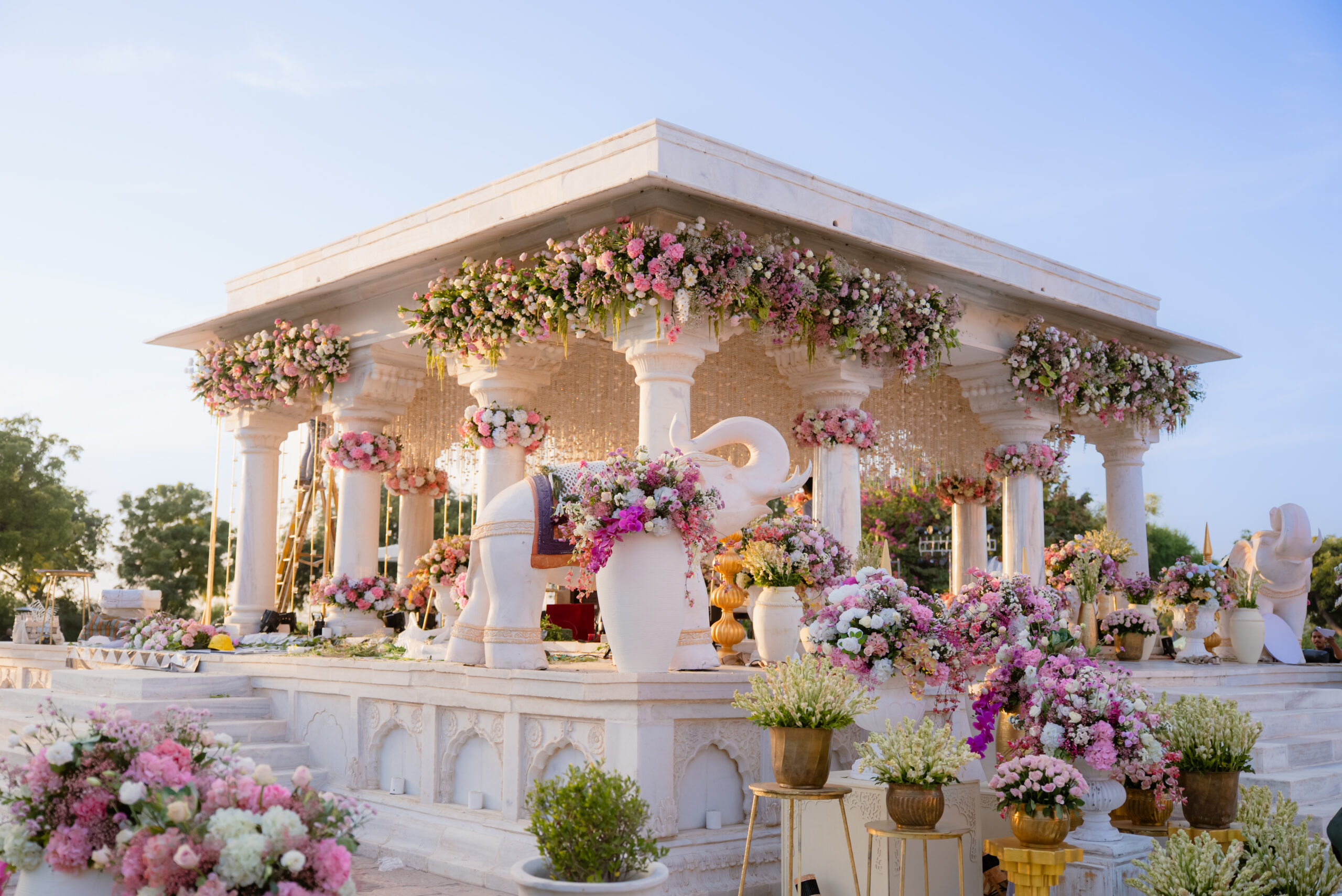 Ornate wedding venue decorated with gold and floral elements
