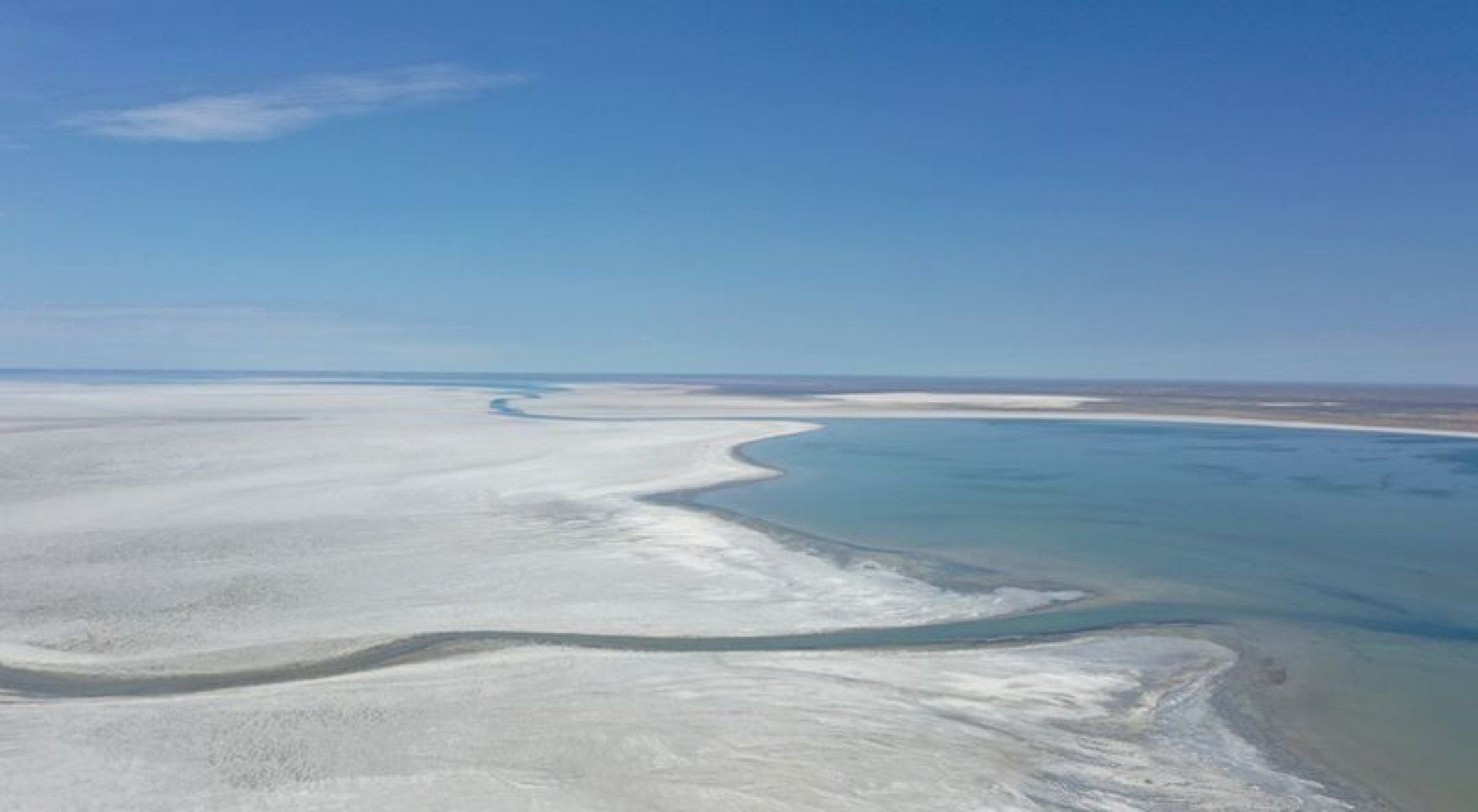 Satellite view of the dried seabed of the Aral Sea showing exposed salt flats