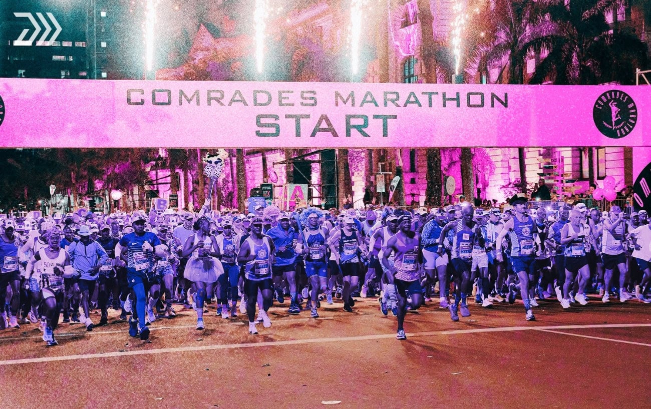 Comrades Marathon runners navigating the historic route