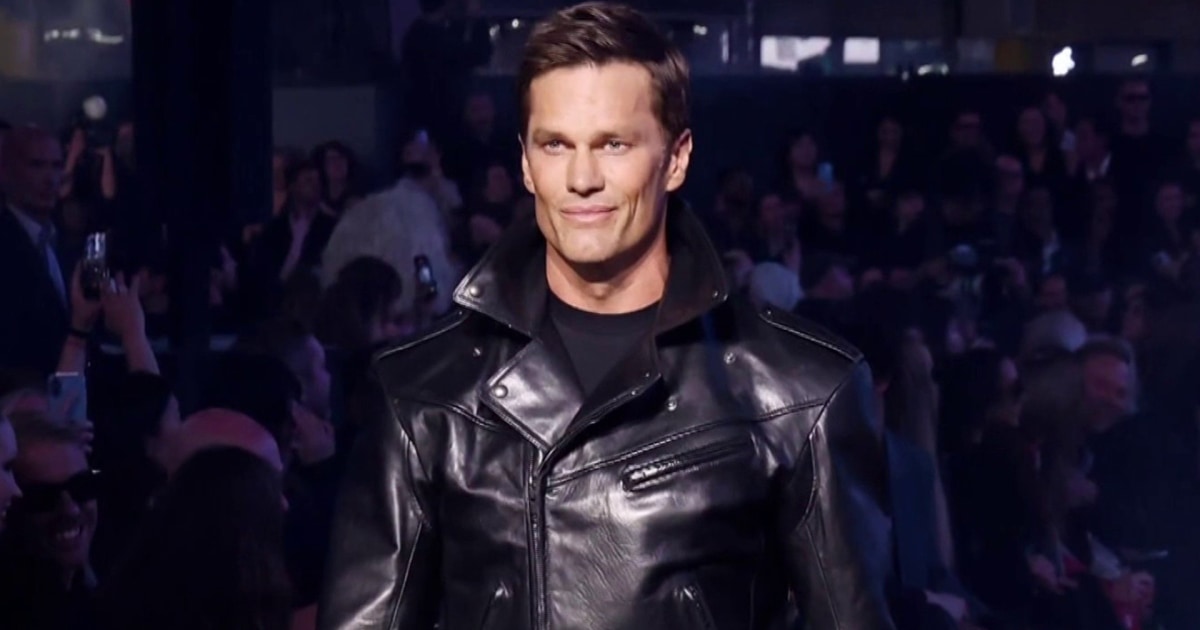 Tom Brady walking the Gucci 2027 Collection runway in an all-leather look