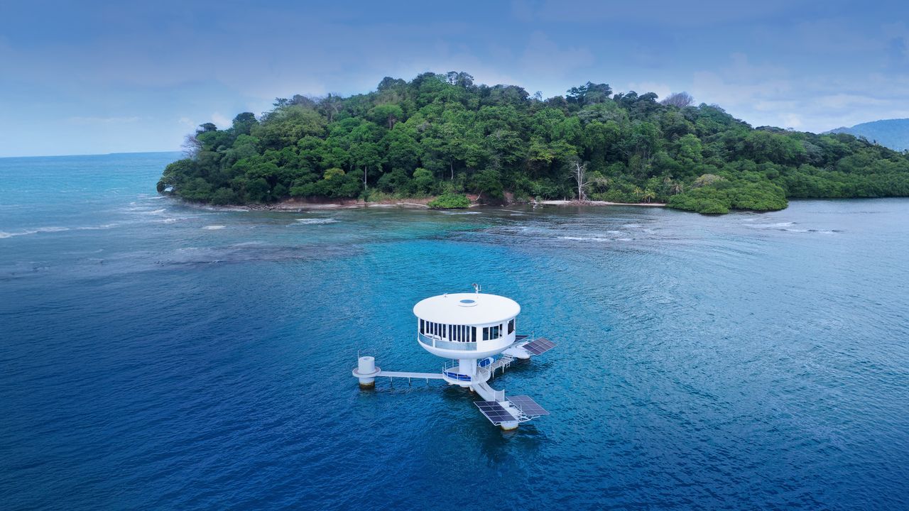 Aerial view of a modern tiny structure featured in Architectural Digest's 2026 roundup