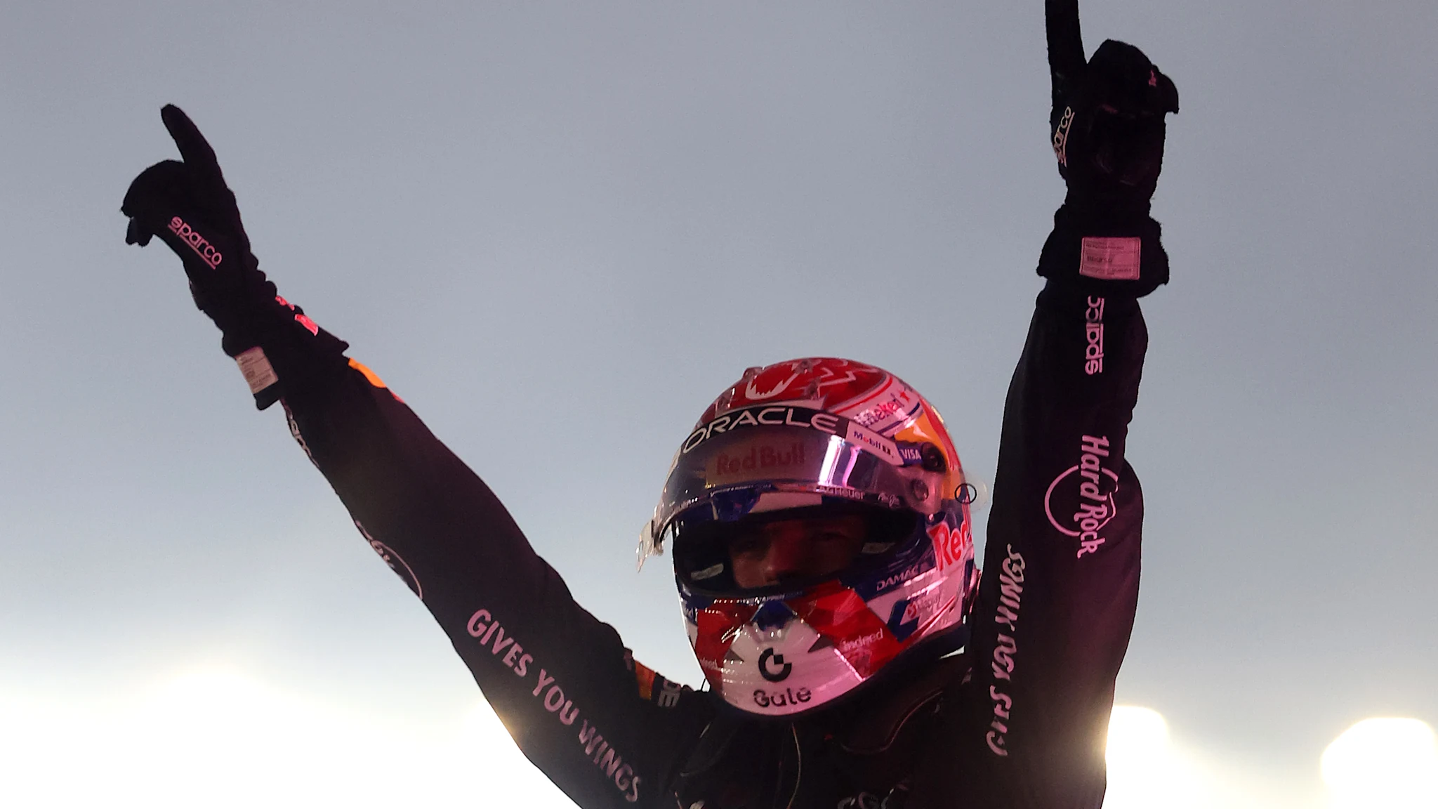 Max Verstappen celebrates his first Singapore GP victory