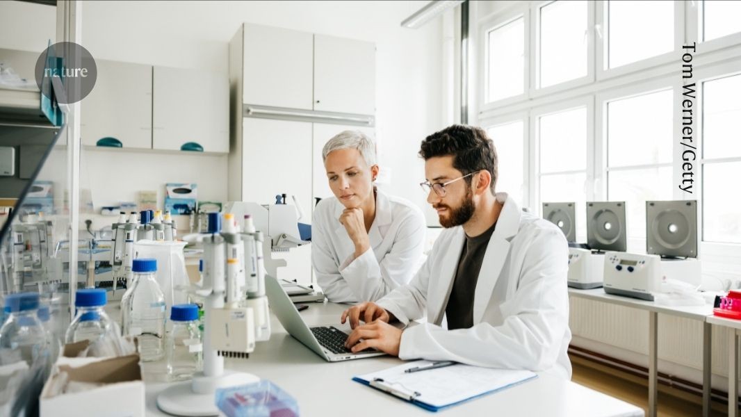 A researcher working in a lab setting, illustrating pressures on European science funding