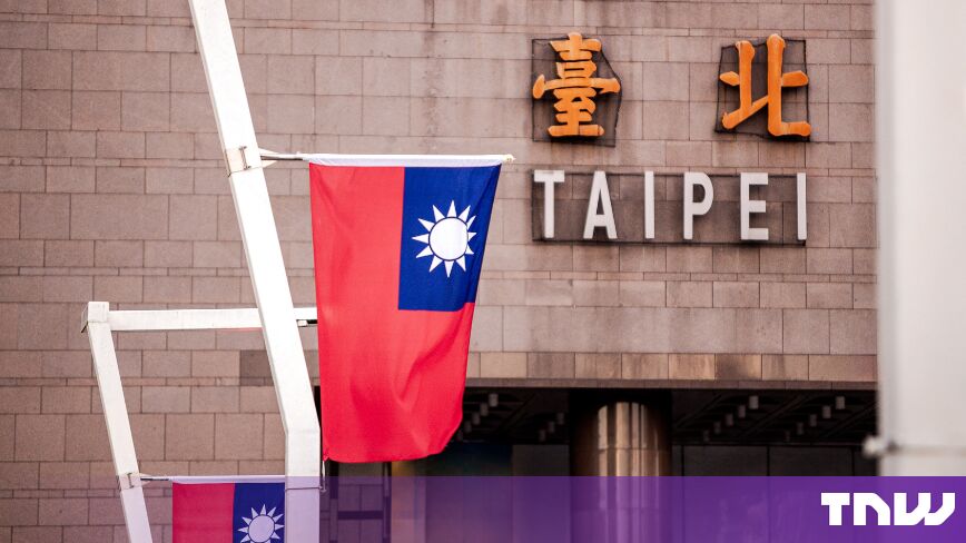 Taiwanese flags at a semiconductor event highlighting diplomatic efforts