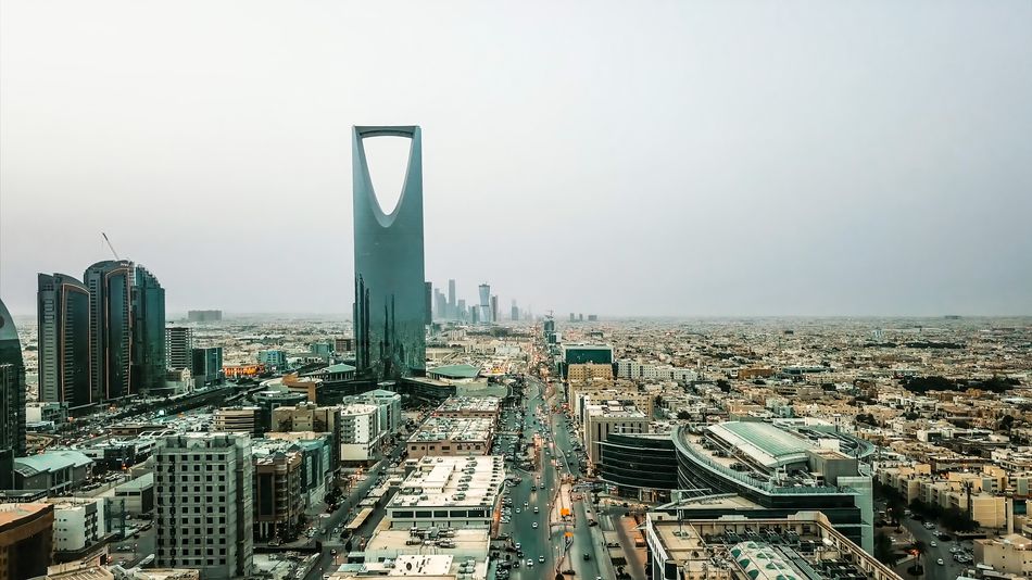 Business people discussing finance in Saudi Arabia