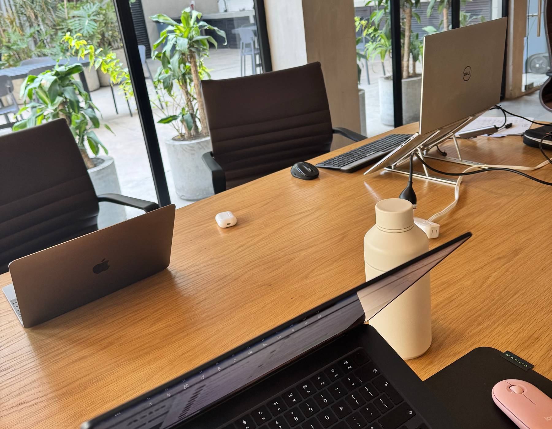 A coworking and coliving space in Mexico City with laptops, representing one of the top digital nomad cities