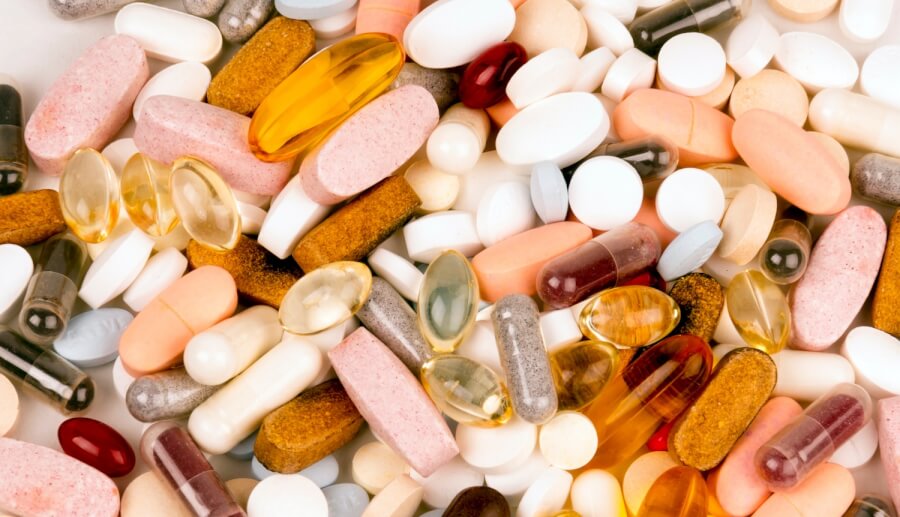 Vitamin and compound bottles, illustrative of anti-aging intervention research