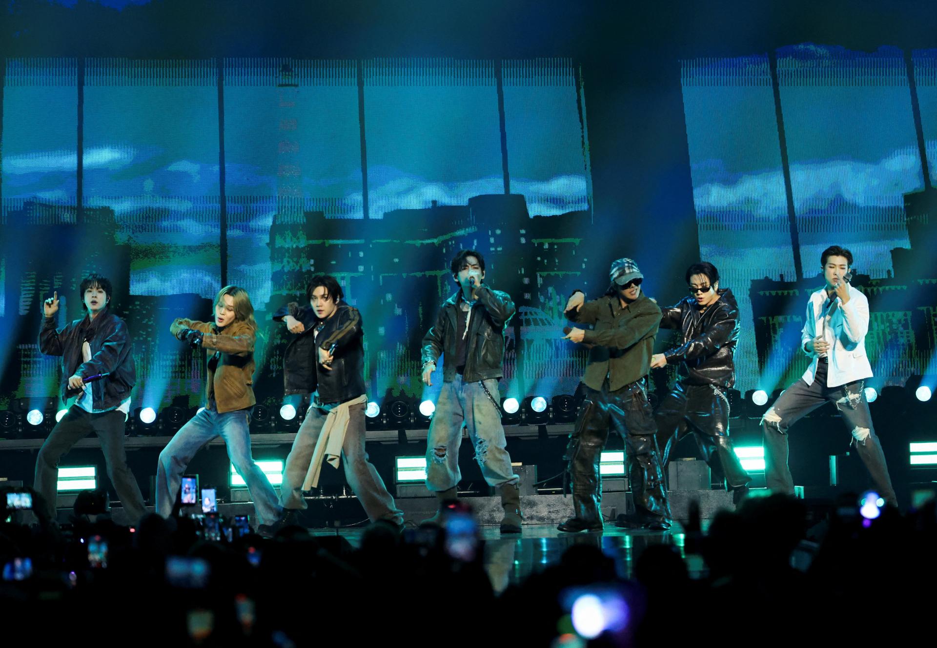 BTS performing at a stadium during their record-breaking Arirang world tour