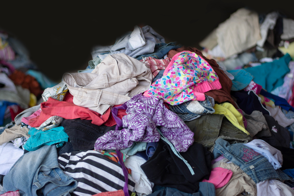 Textile workers sorting materials at a recycling facility