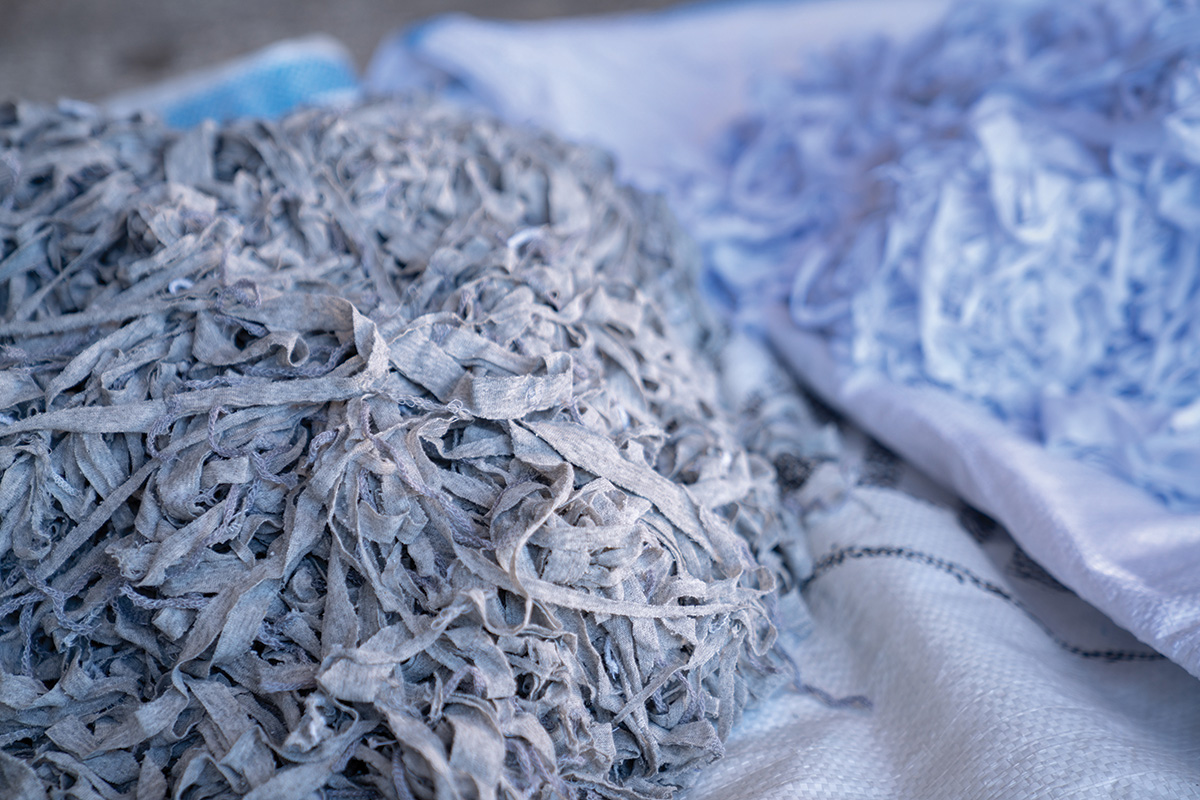 Shredded fabric ready for textile recycling