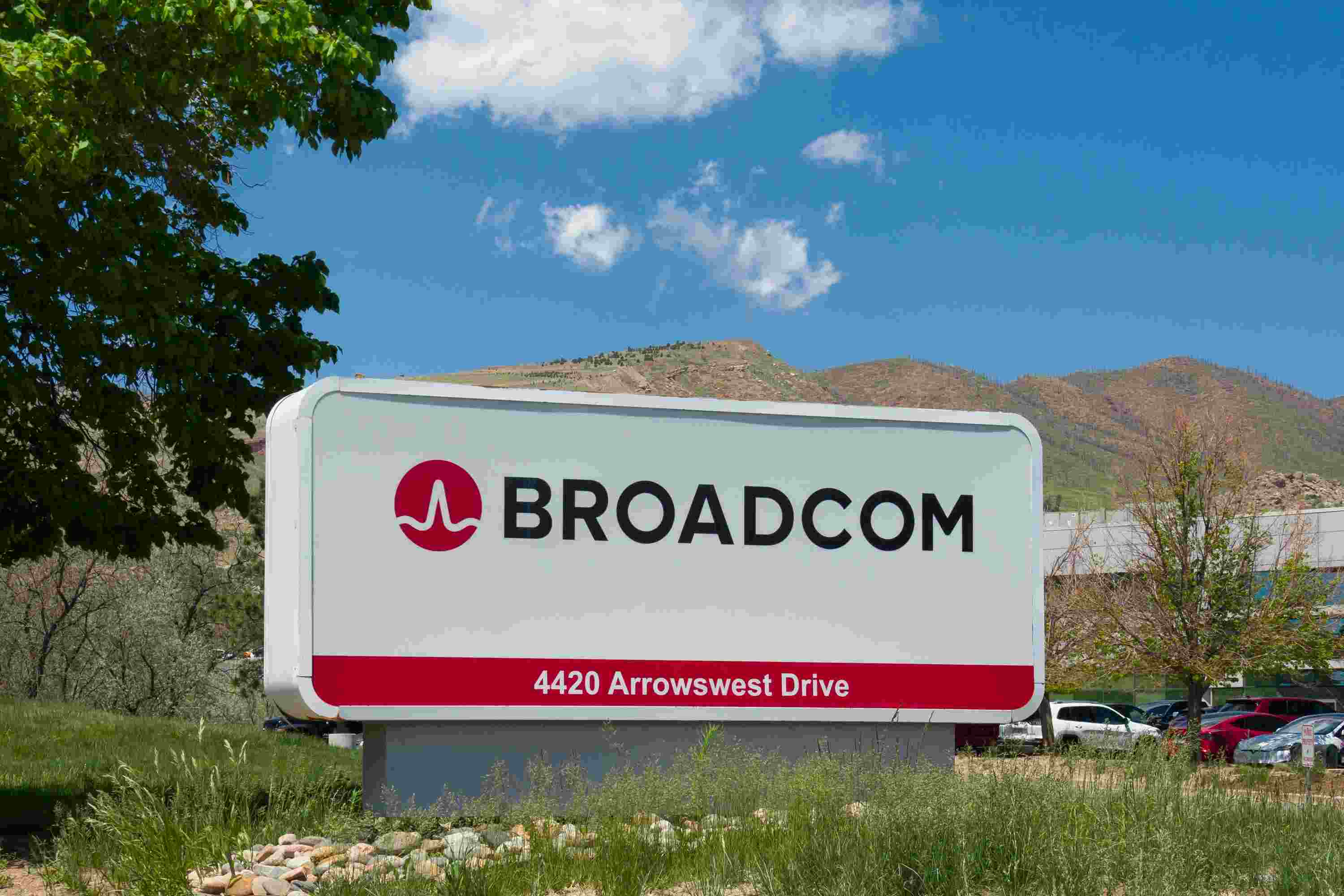 Broadcom logo and financial chart representing the $50 billion financing deal