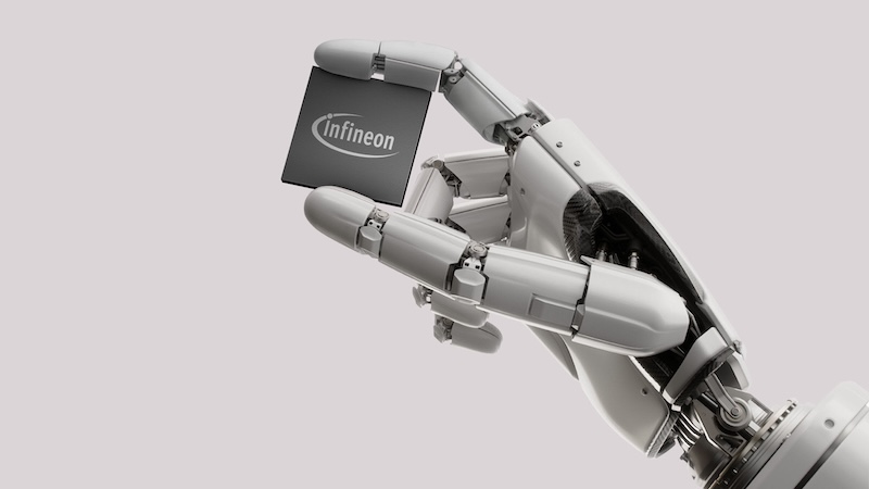 Humanoid robotic arm with an Infineon semiconductor chip in the background