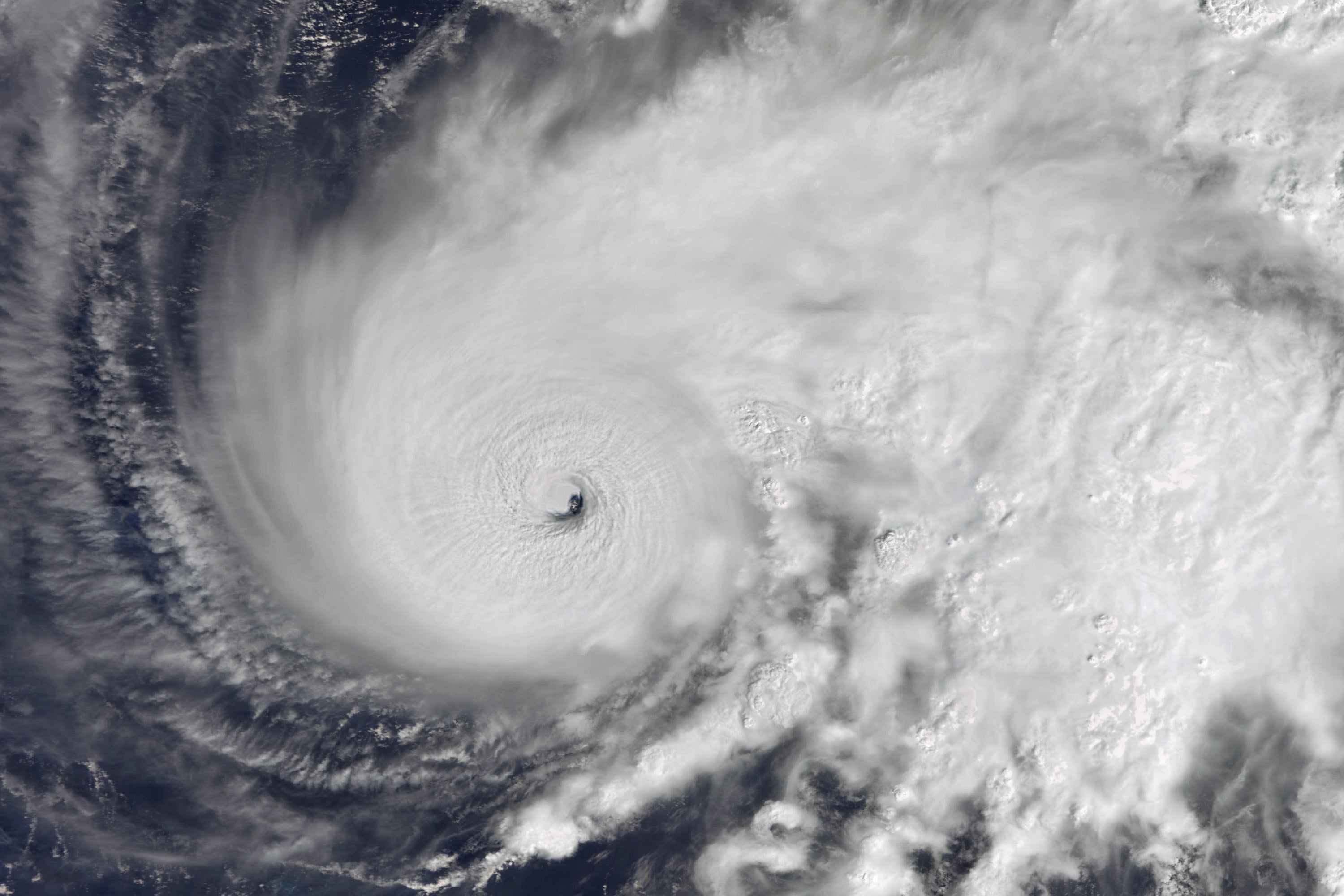 Hurricane satellite imagery showing rapid intensification