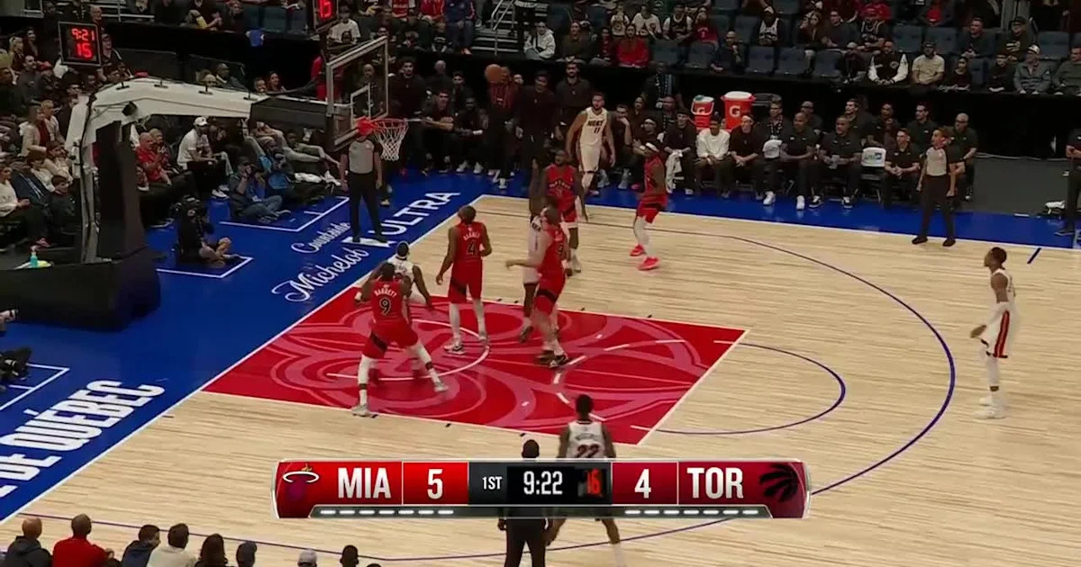 Giannis Antetokounmpo drives to the basket in Miami Heat preseason action