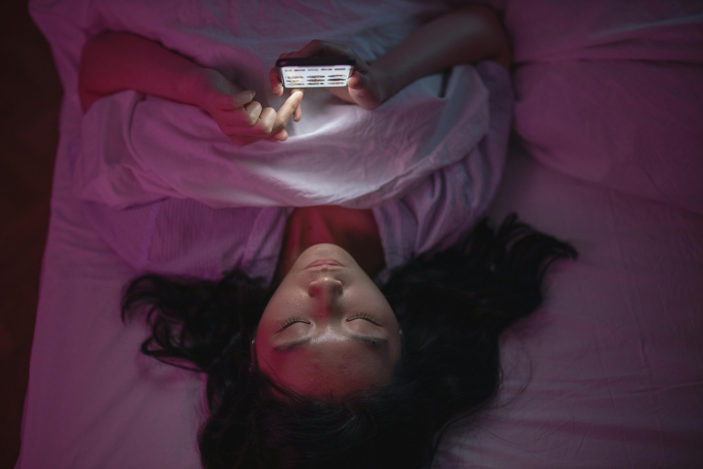 Person using a digital device, representing internet-based mental health interventions
