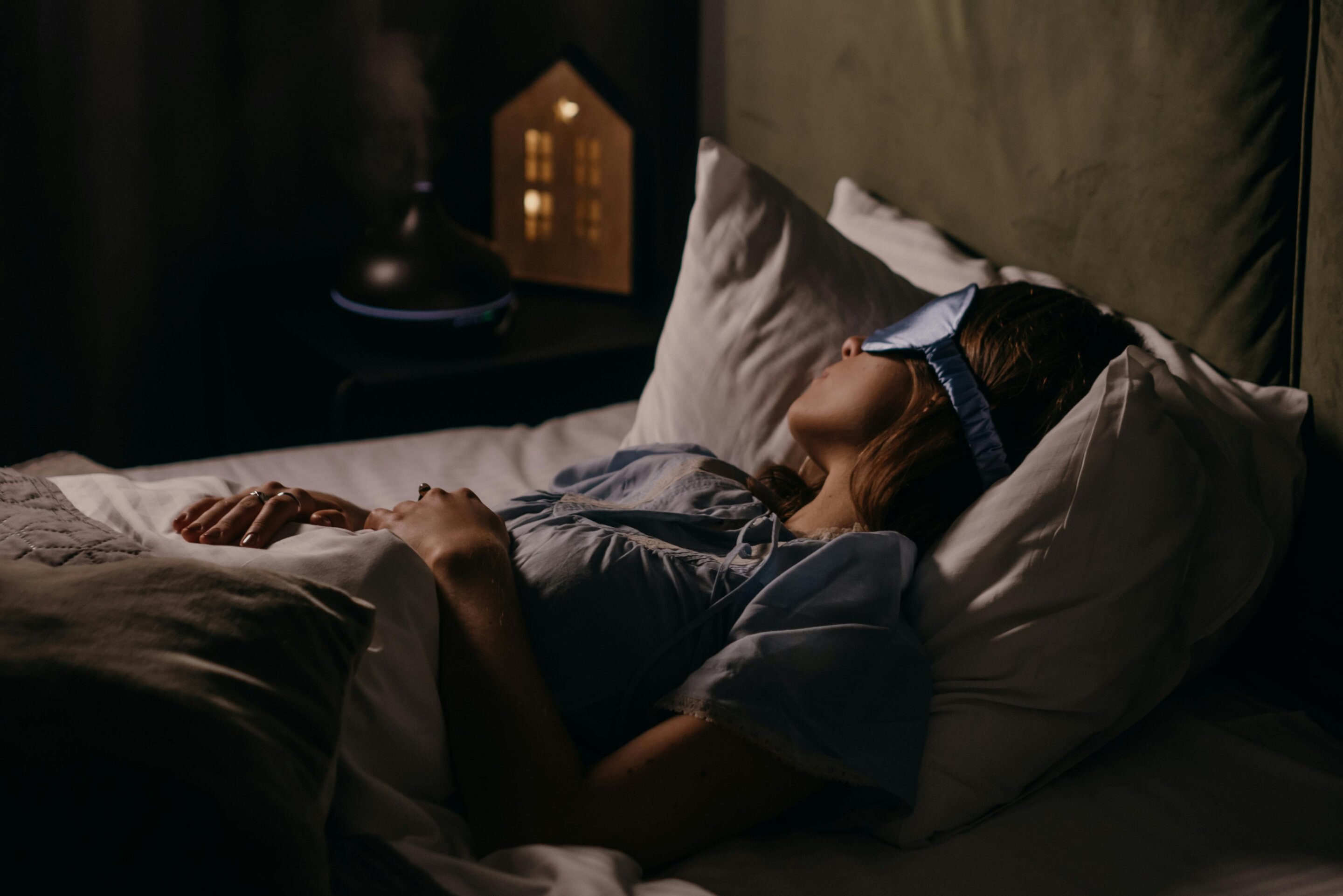 Woman experiencing sleep disruption, highlighting menopausal insomnia challenges