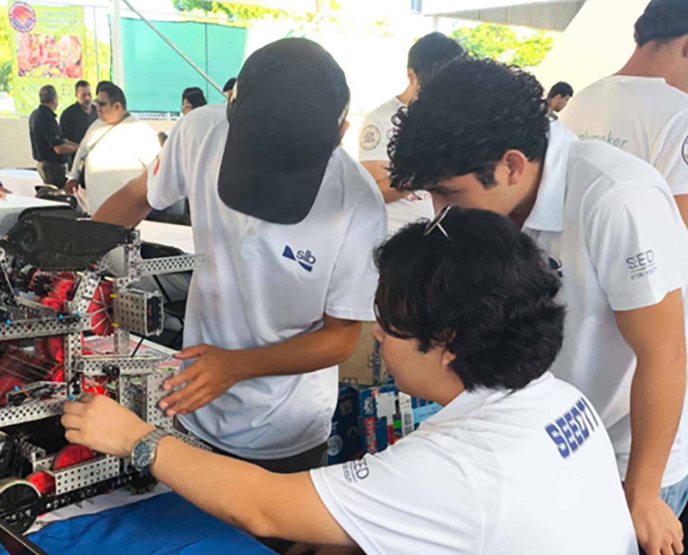 SLB youth mentoring program in robotics and coding