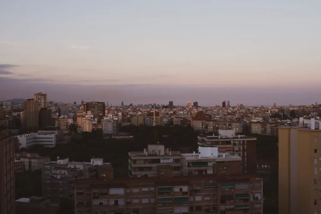 Barcelona city council meeting approving new tax measures for tourist flats