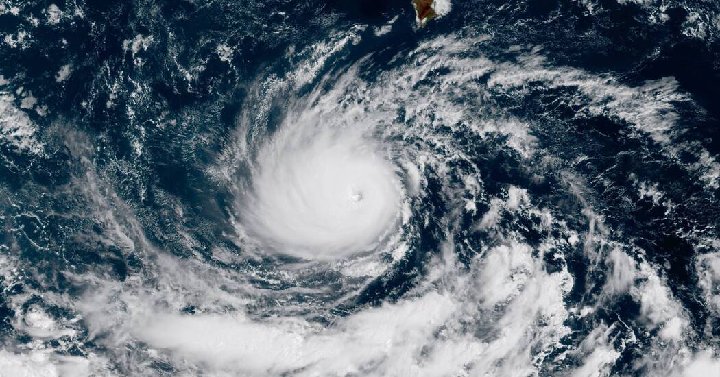 Satellite map tracking Hurricane Lowell south of Hawaii