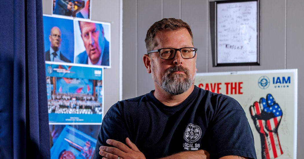 Machinists union members at a workplace, from the NYT's coverage of AI negotiations