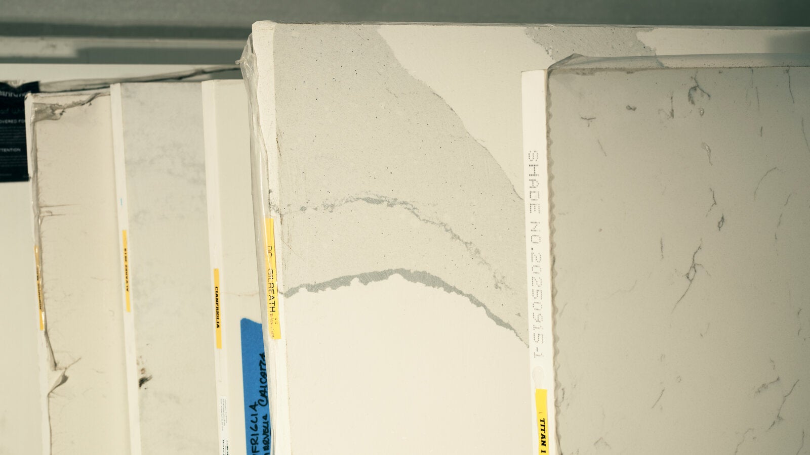 Engineered stone slab being cut in a workshop