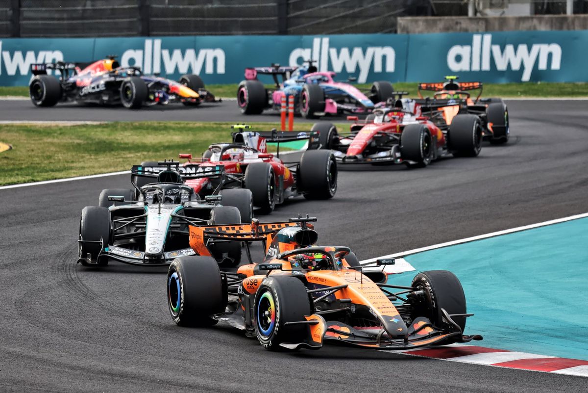 A 2026 F1 car battles through a corner — the new aero regulations and hybrid systems have generated widespread driver criticism
