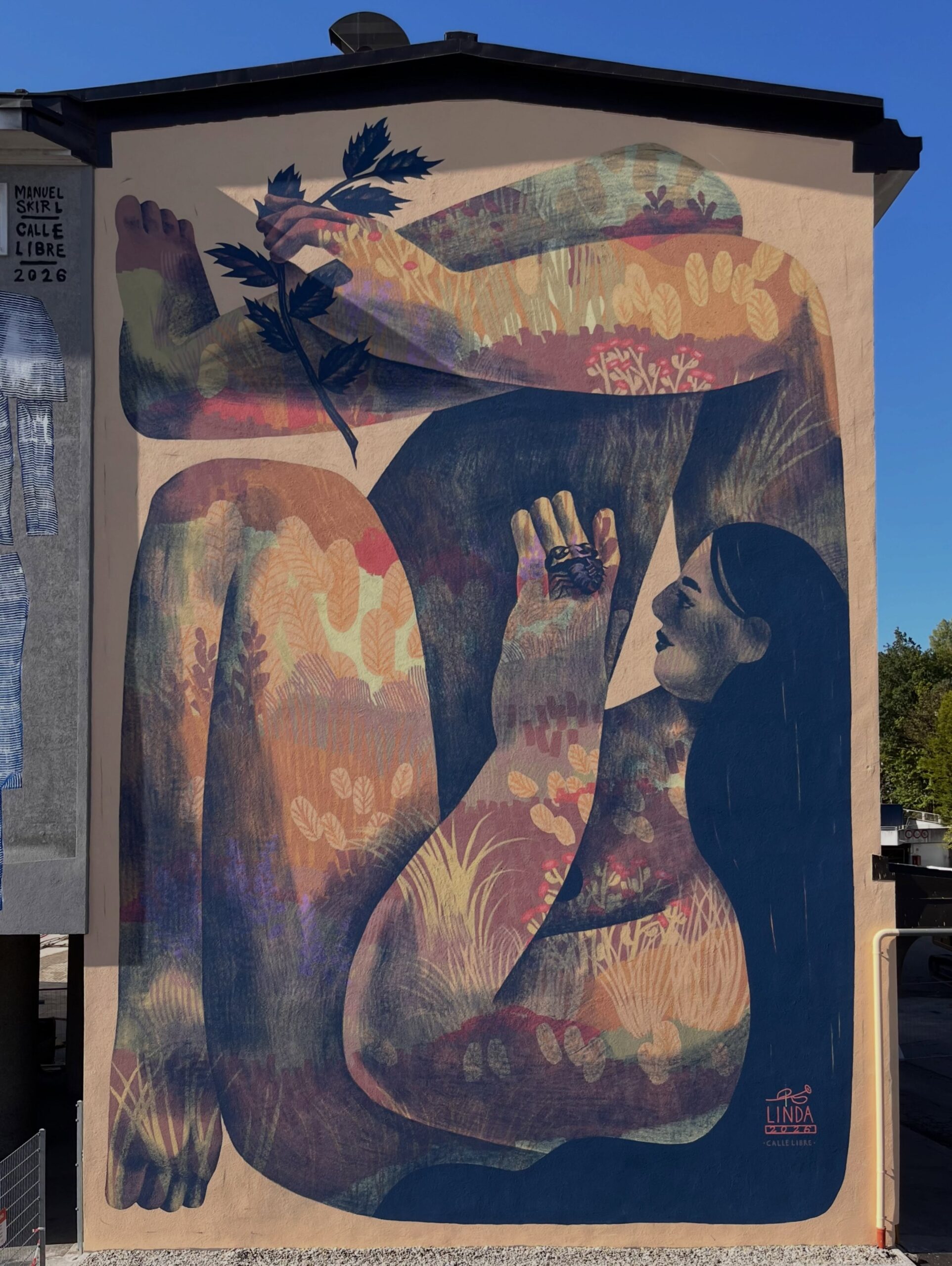 Linda Steiner's "Unter Brennnesseln" mural at Post City Linz