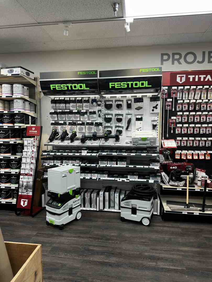 Comprehensive woodworking tool set display with hand tools and power tools organized by category