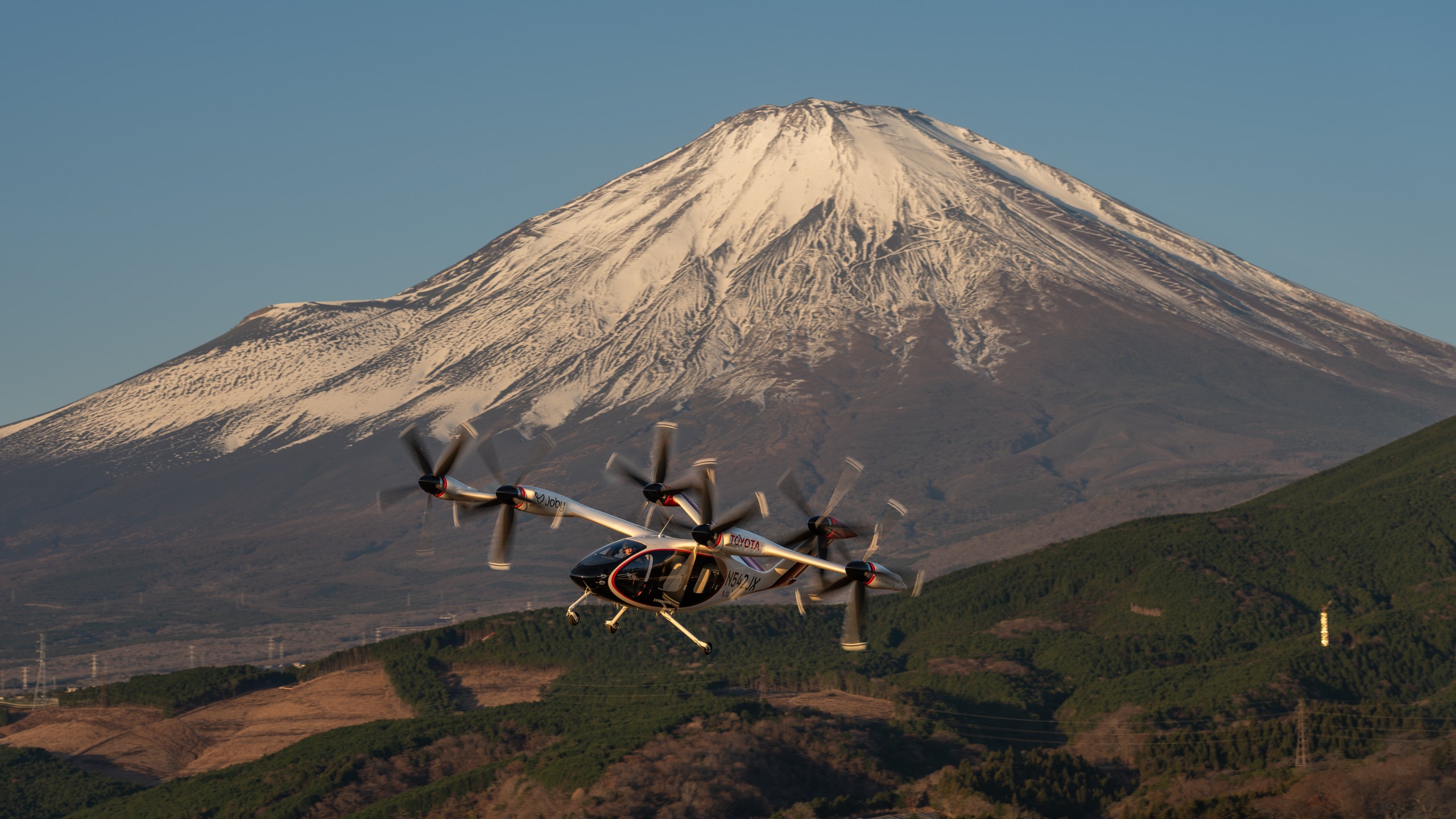 Toyota and Joby formed a strategic manufacturing partnership to scale production of the S4 air taxi, marking a pivotal moment for eVTOL commercialization