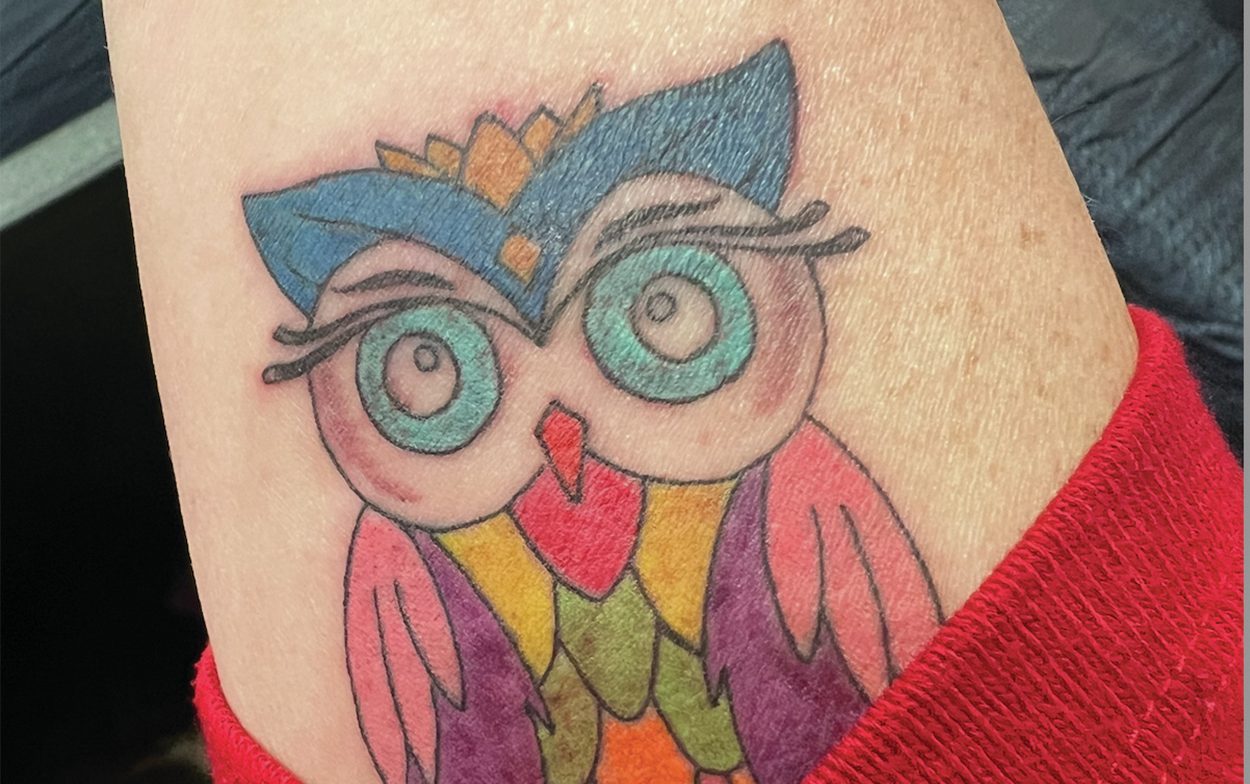 Owl tattoo with spiritual significance