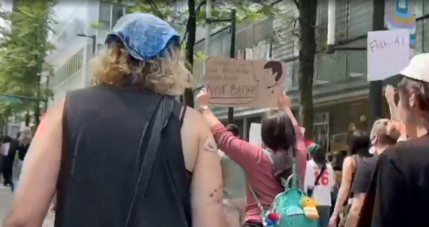 Protesters marching through Downtown Vancouver against AI data centres