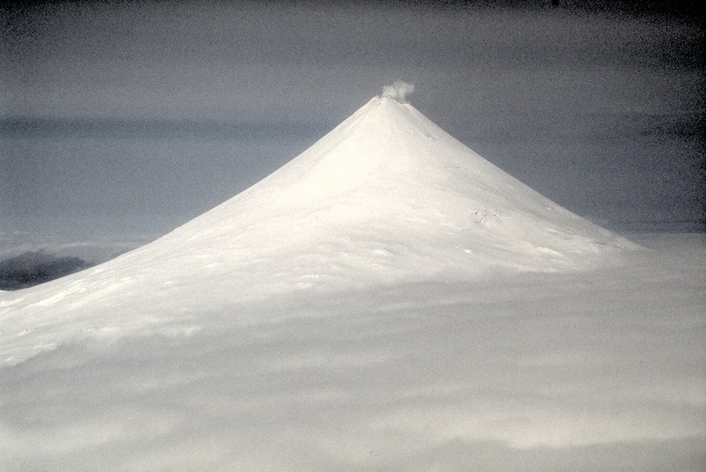 Shishaldin volcano viewed from webcamera showing steam and gas emissions