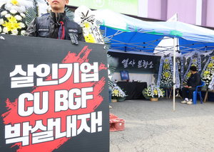 Cargo Truckers Union members hold a press conference following the Labor Committee's decision