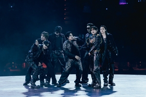 BTS performing at SoFi Stadium during the Arirang World Tour